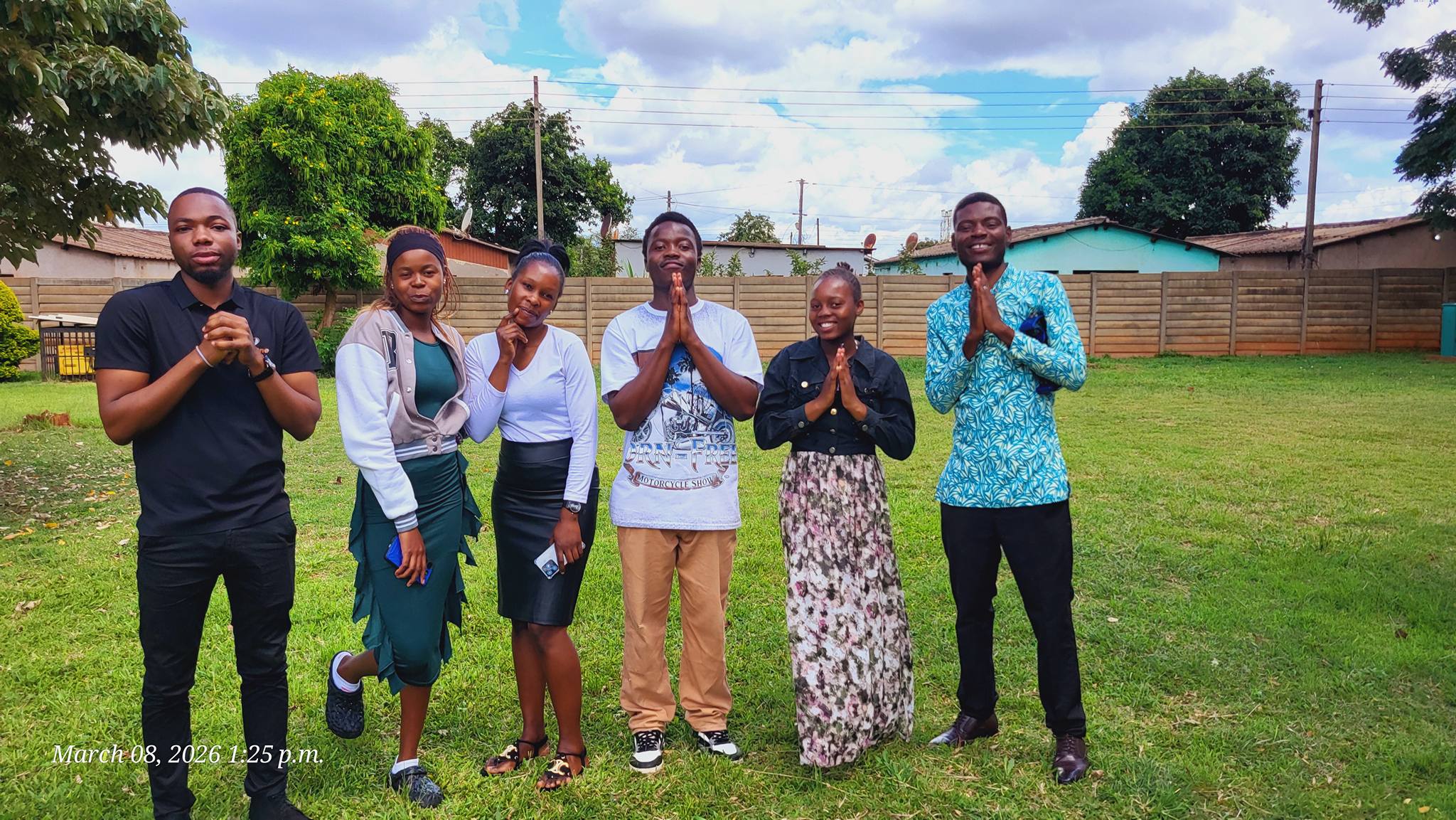 Members in prayer together