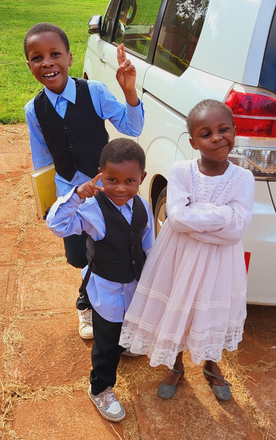Children dressed for Sunday service